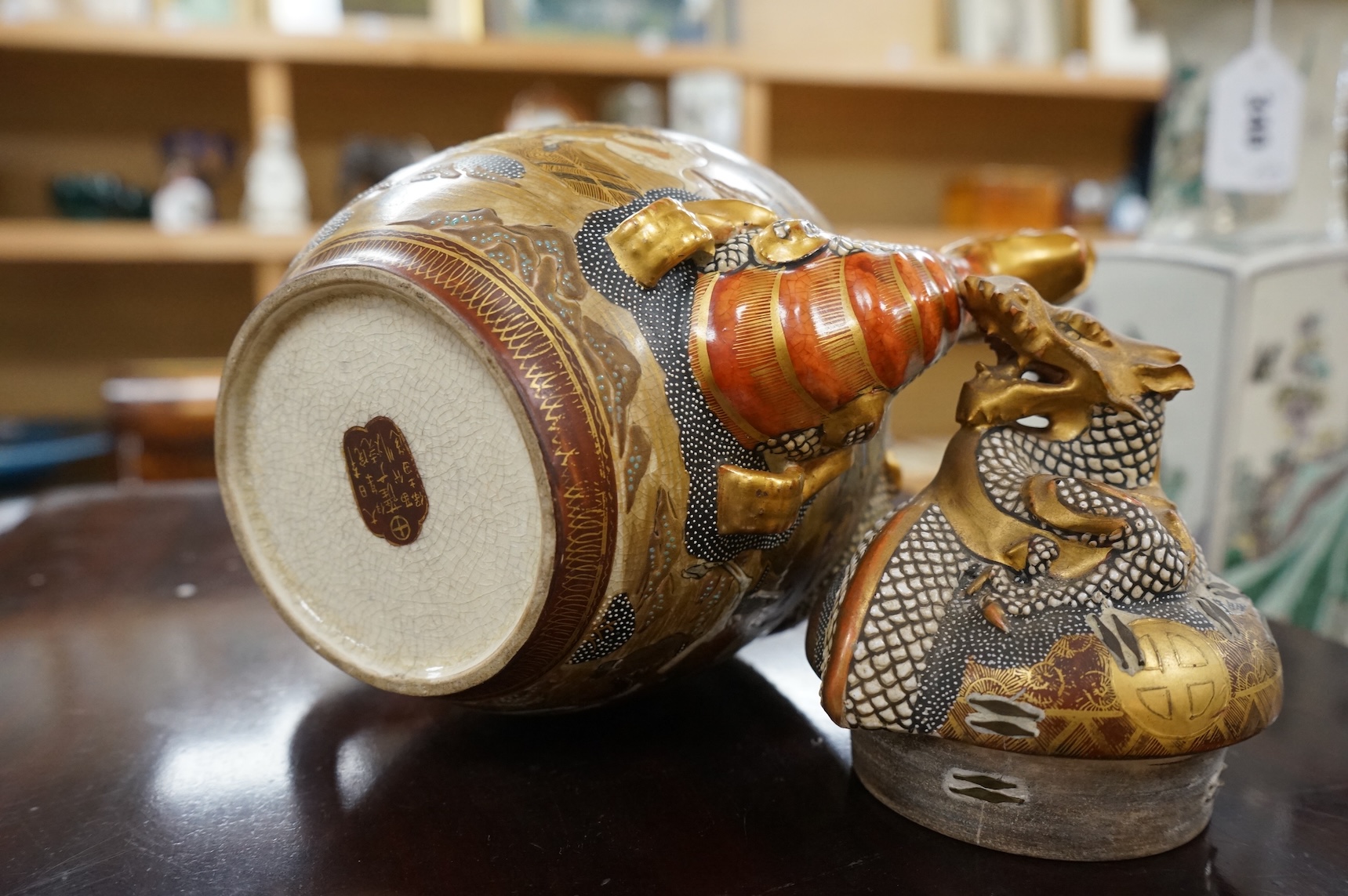 A Japanese Satsuma teapot dragon, Meiji period, 23cm high